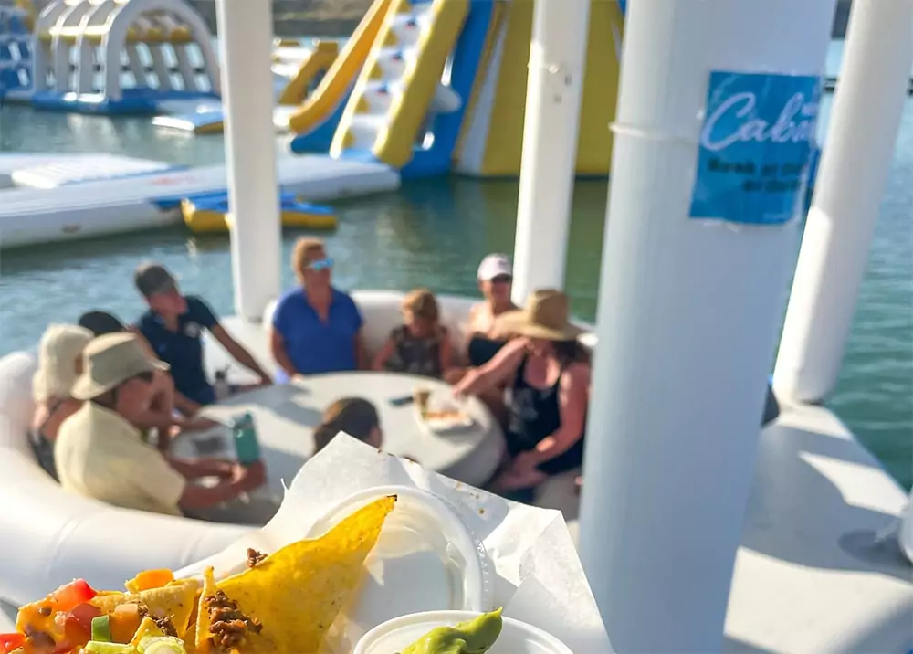 guests-relaxing-in-floating-cabanas-at-a-water-park