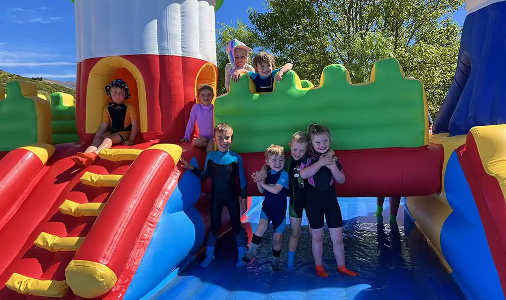 Children-Enjoying-Kids-Inflatable-Water-Playground