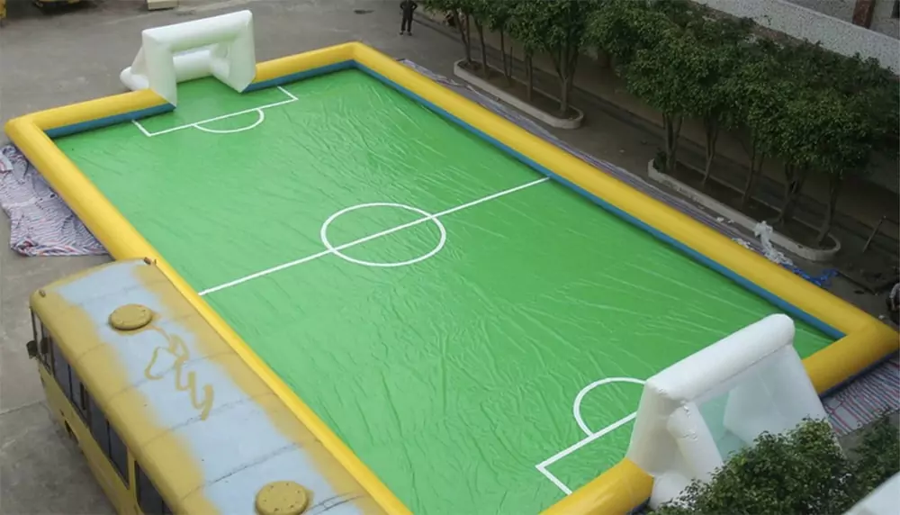 a-green-inflatable-soccer-field