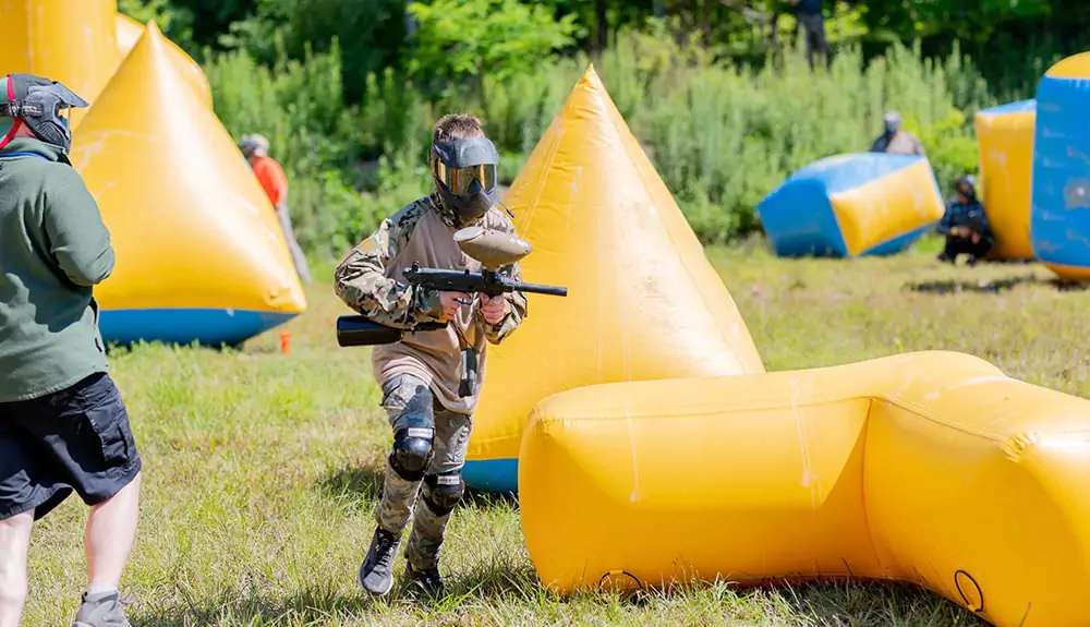 players-engaging-in-action-inside-a-paintball-inflatable-arena