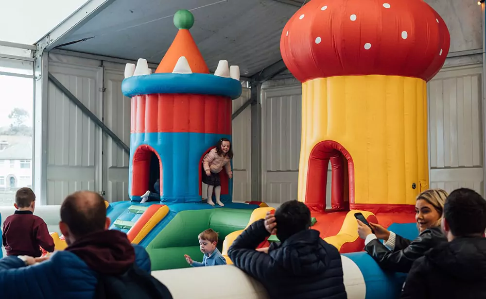 Parents-With-Children-Inside-Kids-Inflatable-Water-Park