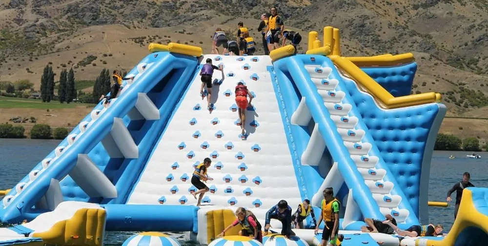people-enjoying-bouncia-inflatable-water-games-design