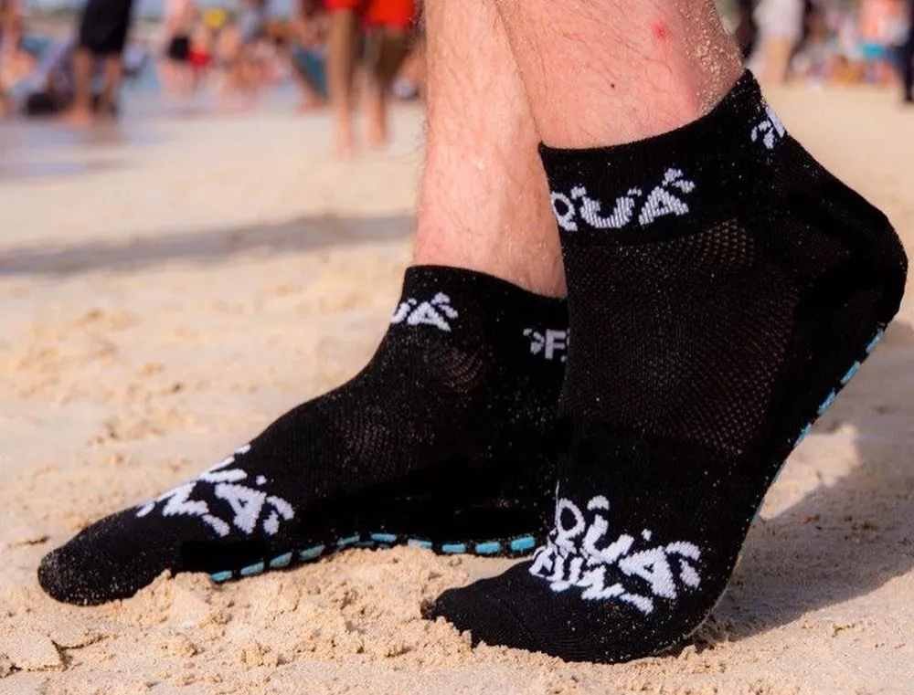 non-slip-socks sold-as-extra-income-source-in-commercial-inflatable-water-parks