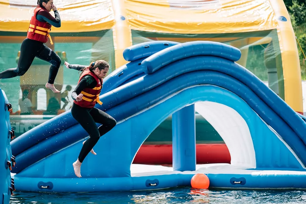 visitors-enjoying-an-inflatable-water-park-element