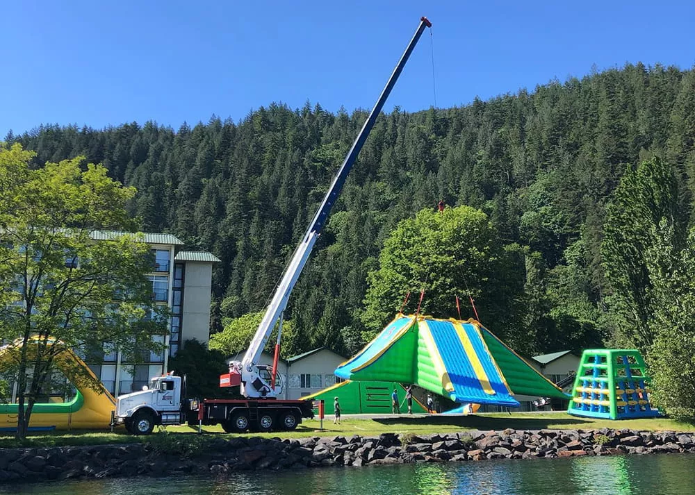 inflatable-water-park-on-site-installation-with-crane