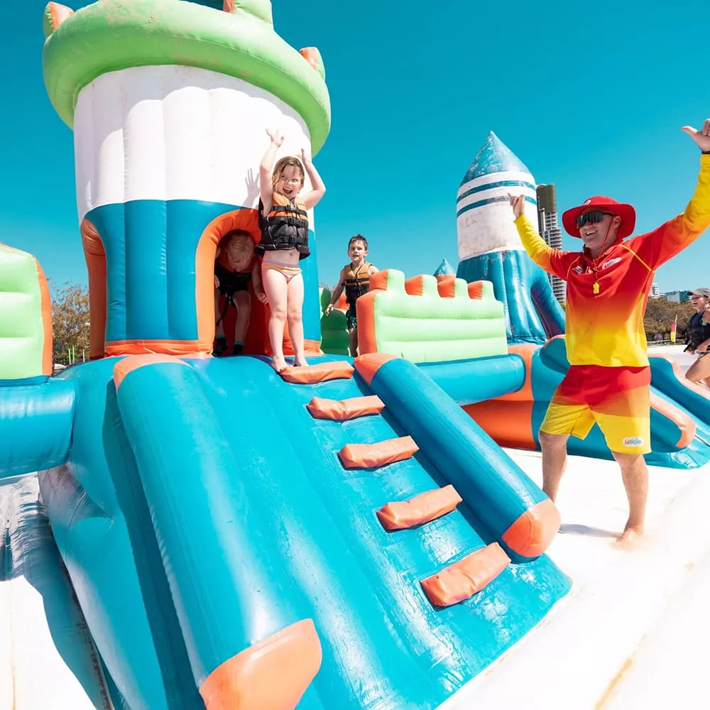 child-in-life-jacket-at-inflatable-water-park