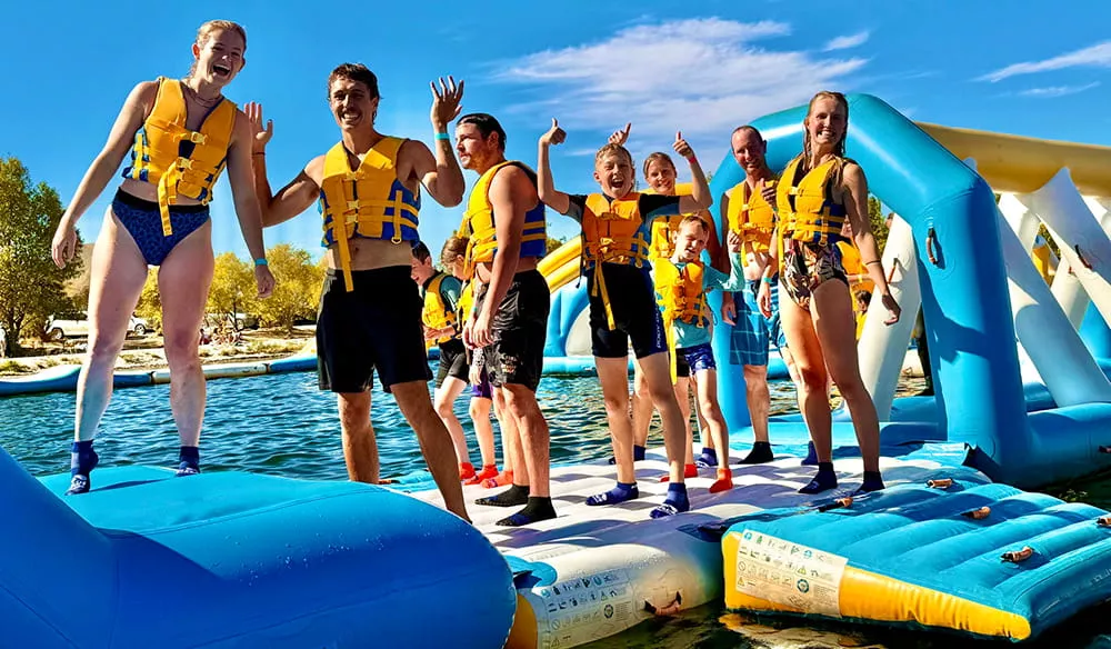 visitors-wearing-life-jackets-at-an-inflatable-water-park