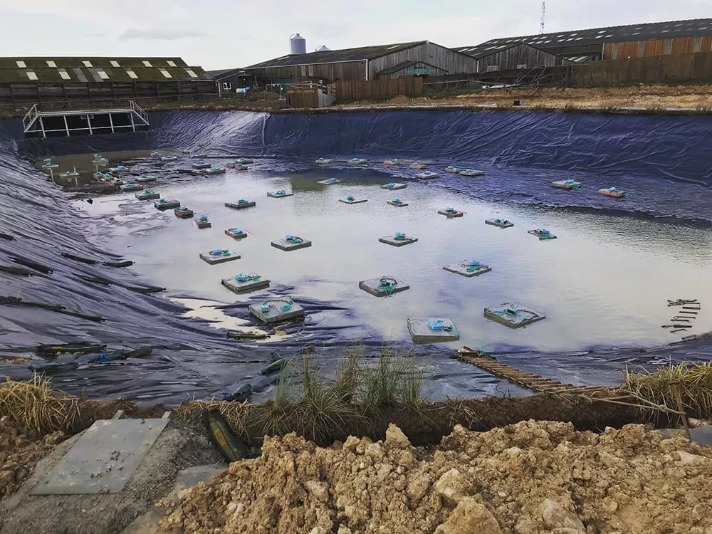 floating-water-park-concrete-anchoring-on-lake-bottom
