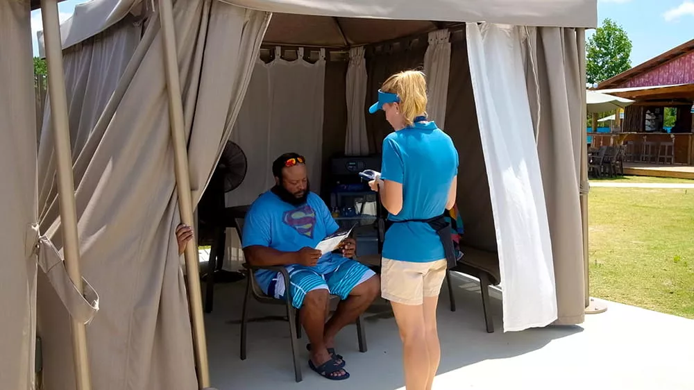 commercial-inflatable-water-park-staff-addressing-visitor-concerns