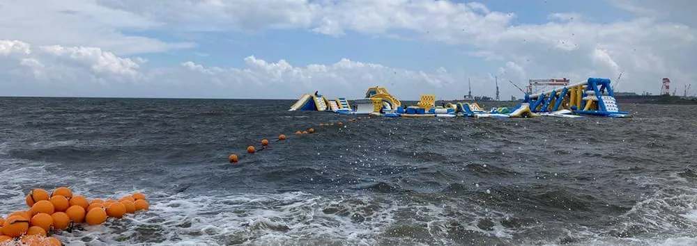 Inflatable water park exposed to strong wind and waves