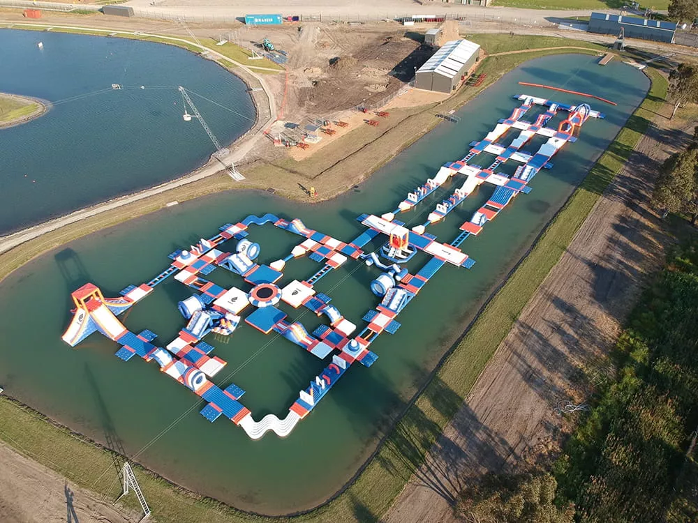 Inflatable-Aqua-Park-Customization-Options-with-racing-lanes-and-modular-activity-zone
